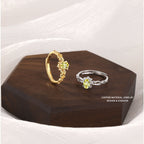Japanese-style imitation olivine ring women's hollow smile zircon adjustable ring gold-plated niche design wholesale