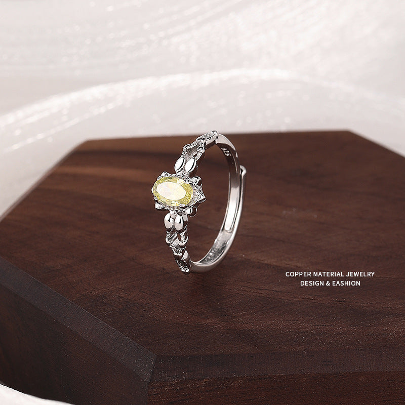 Japanese-style imitation olivine ring women's hollow smile zircon adjustable ring gold-plated niche design wholesale