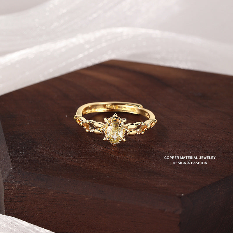 Japanese-style imitation olivine ring women's hollow smile zircon adjustable ring gold-plated niche design wholesale