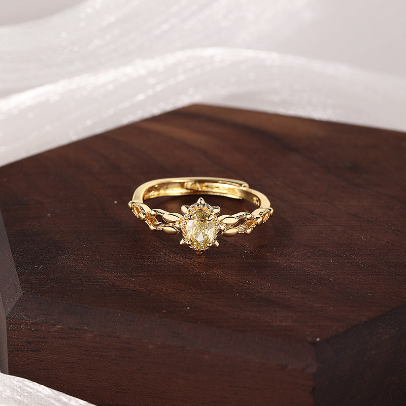 Japanese-style imitation olivine ring women's hollow smile zircon adjustable ring gold-plated niche design wholesale
