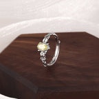 Japanese-style imitation olivine ring women's hollow smile zircon adjustable ring gold-plated niche design wholesale